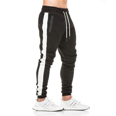 China 2021 Anti-Wrinkle Bulk Running Clothing Side Stripe Design Custom Pants Mens Workout Dry Fit Hip Hop Joggers Men for sale