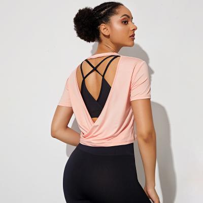 China 2021 Summer Breathable Yoga Shorts Sleeve White Light Open Back Beatuiful Yoga Crop Tops Cheap Gym Top T-Shirts for sale