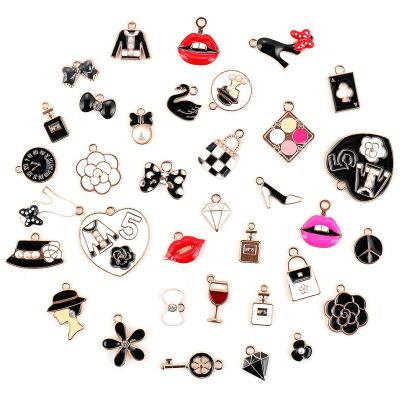 China Designer Brand Designer Charm 35Pcs Clog Shoes Charm Bead Decorations Custom Metal Bling Diy Mexican Pieces Charms for sale