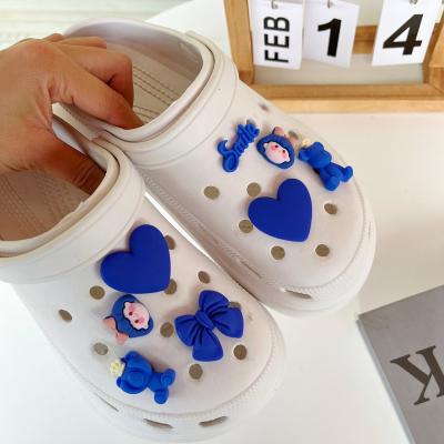 China DIY Blue Bow-knot Little Girl's Blue Cross Clog Charm Charms Shoe Charms Luxury Accessories for sale