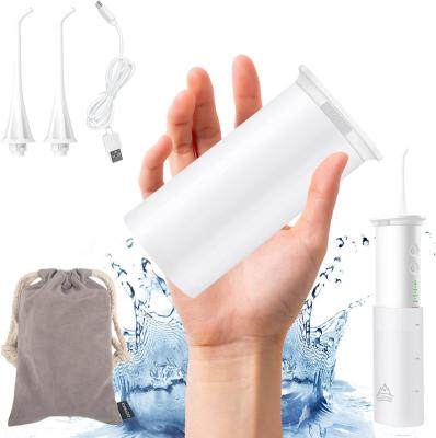 China Spout Design Portable Refillable Water Flosser Water Reservoir Tooth Remover Humanized Dental Water Flosser for sale