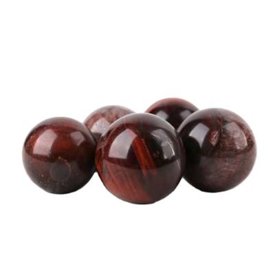 China Natural Red Stone Ball Donghai Tiger Eye Hand Game Ball Semi Precious Stone Mixed Jewelry for sale