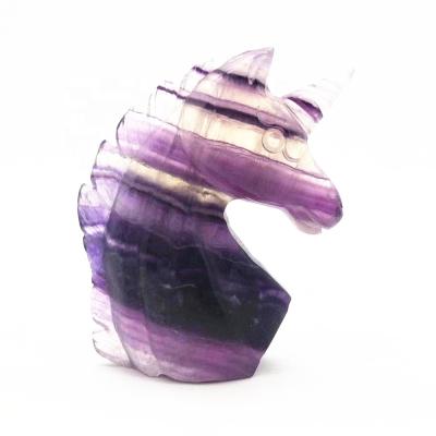 China Donghai Crystals Wholesale Bulk Hand Cut Polished Rainbow Fluorite Unicorn Fengshui Stones For Natural for sale