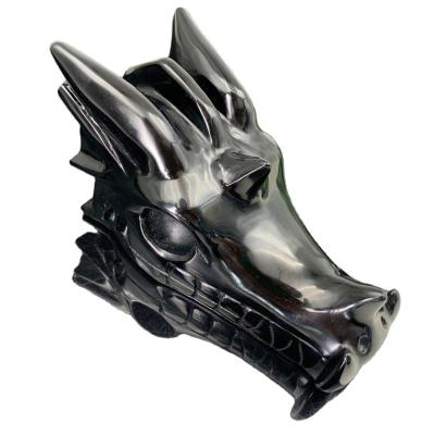 China Donghai Natural Crystal Polished Crystal Obsidian Black Dragon Skulls Master feng shui Reiki for sale