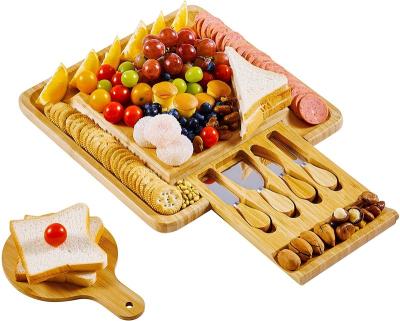 China Sustainable Cheese Tray Single Cutting Board Wooden Bamboo Cheese Board Set With Cutlery for sale