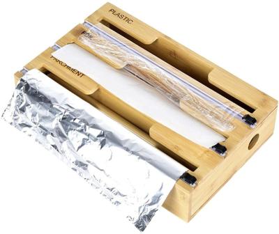 China Sustainable Kitchen Drawer Organizer Foil Wrap Dispense Aluminum Foil Parchment Bamboo Dispenser With Cutter for sale