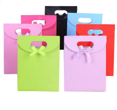 China Recyclable Fashion Flip Cover Gift Bag and Gift Bag Glue Paper Packaging Bag for sale