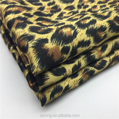 China Hot Sale Plain Printed Leopard Shrink-Resistant Cooleye Printing Bright Fabric 50D*75D For Scarf , Satin Scarves for sale