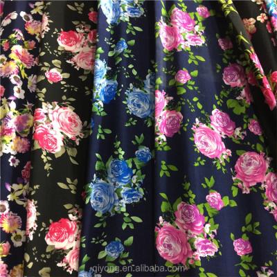 China Soft cheap price 40S 100% woven viscose rayon printed fabric reactive circle printing for dress for sale