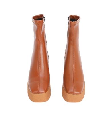 China Waterproof Ankle Heels Sexy Women's Platform Shoes And Boots Leather Women's Martin Boots for sale