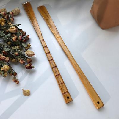 China Long Wooden Handle Shoehorn Household Solid Wood Portable Pregnant Women And Older Wear Shoes Artifact for sale