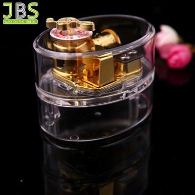 China Suitable for all occasions clear dome acrylic music box with wind mechanism for sale