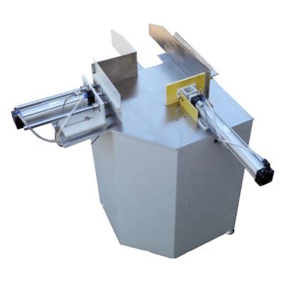 China Cheapest Manual Food Adult Diaper Packing Machine , Simple Bagging Machine For Diapers for sale