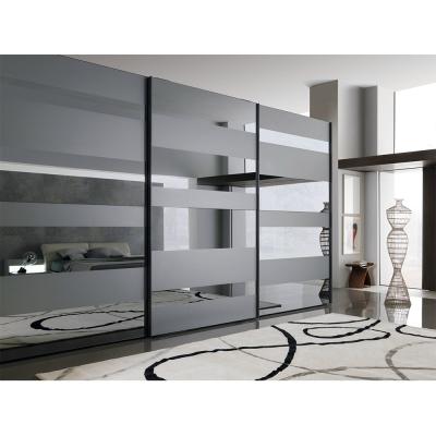 China Durable Dark Gray Glass Mirror Three Track Sliding Door Wardrobe for sale