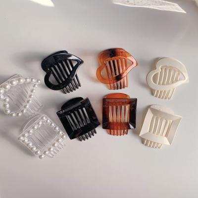 China Simple temperament hair claw plastic hollow square clips and new cute hollow love heart hair claw resin for sale