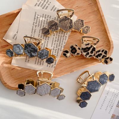 China Simple temperament and cute hot sale hair accessories hair claw colorful luxury geometric figure fashion alloy hair claw clip for sale