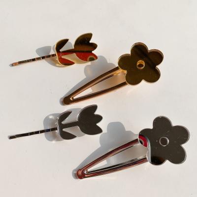 China Simple temperament and cute INS alloy hair clips flower design hot selling outdoor hair pins for girls for sale