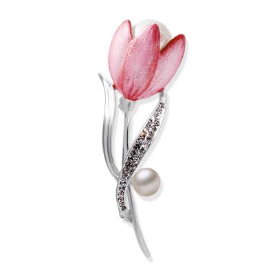 China Luxury high quality fashion alloy shiny Lotus bud natures pearl flowe brooch pins inlay import rhinestone brooch pins for ladies for sale