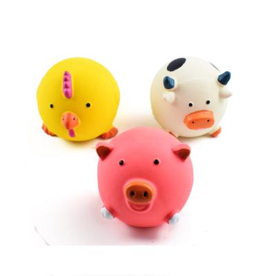 China Pet stocked latex sounding toy round ball pig head chicken head molar teeth cleaning puppy toy for sale