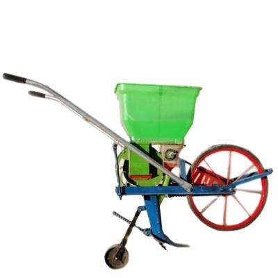 China Push Drum Vegetable Seed Planter Seedling Seeder Hand Push Peanut Corn Single Row Peanut Corn Planter for sale