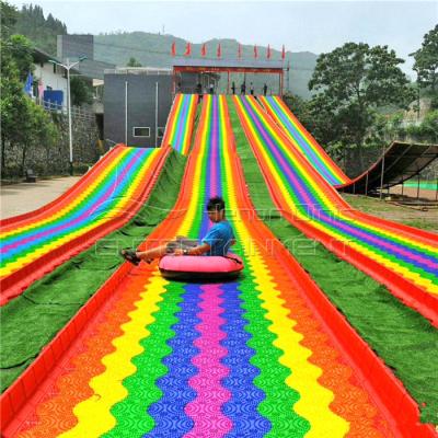 China Newest Outdoor Scenic Area Playground Amusement Park Equipment Rainbow Slide Kids And Adults Plastic Rainbow Slide for sale