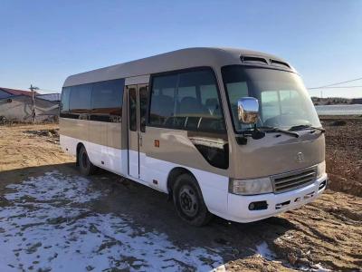 China Toyota Coaster Bus 23 Seater Toyota Mini Bus 2TR Gasoline Engine 2nd Hand School Bus en venta