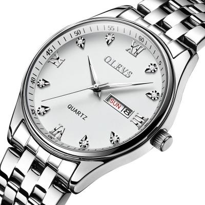 China Classic men's wristwatch date OLEVS quartz watches simple white silver automatic stainless steel business day date for sale