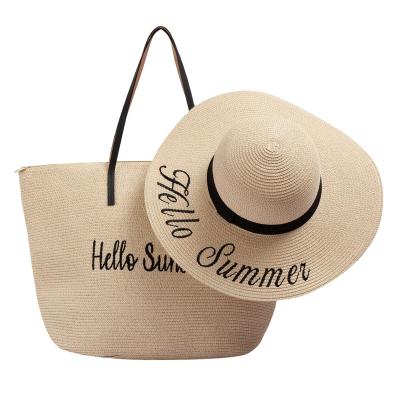 China JAKIJAYI Wholesale Eco-Friendly Summer Ladies Beach Hat Customized Women Wide Black Paper Soft Straw Hat With Shoulder Straw Bag Set for sale