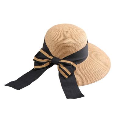 China JAKIJAYI Eco-Friendly Summer Striped Ribbon Bowknot Decoration Beach Bucket Woman Wide Straw Beach Hats for sale