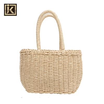 China JAKIJAYI Fashion Summer Vintage Women Wicker Bag Handmade Woven Basket Straw Messenger Bag for sale