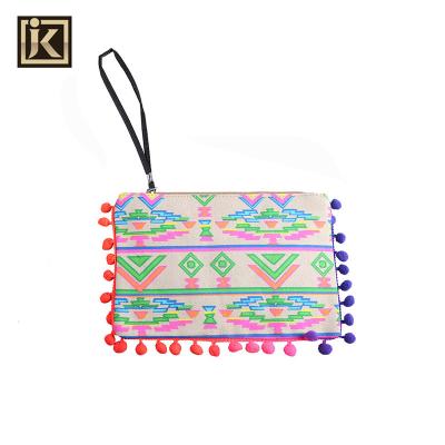 China JAKIJAYI Small Portable Zipper Makeup Cosmetic Canvas Straw Handmade Embroidered Clutch Bag for sale