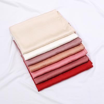 China Hot Sale New Design Plain Muslim Crepe Scarves Malaysia Crepe Shawl Scarf Pleated Satin Silk Hijab for sale