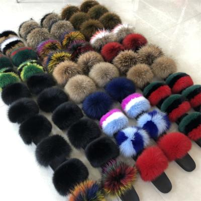 China CUSHIONING Fuzzy Fur Stable High Quality Soft Jelly Mixed Color Fur Slides Slippers for sale