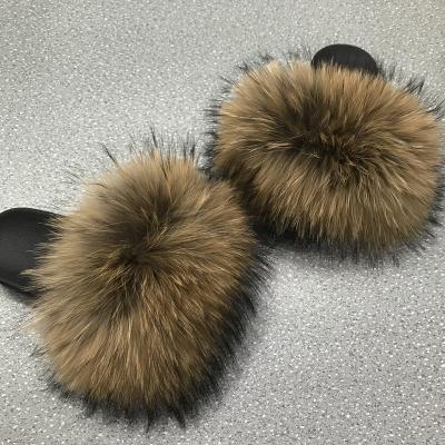 China CUSHIONING Fluffy Raccoon Fur Slippers Real Fur Raccoon Slides Slippers Women Slippers for sale