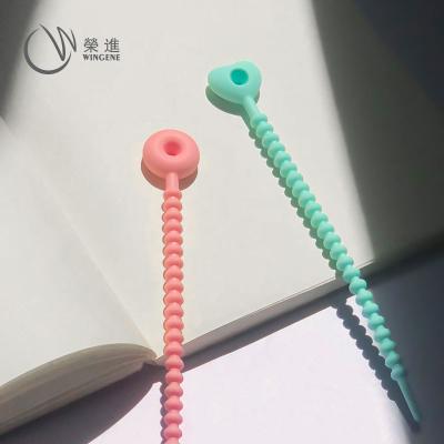 China Creative Eco-friendly Environmental Protection Wire Storage Device Can Adjust Home Cable Silicone Strap for sale