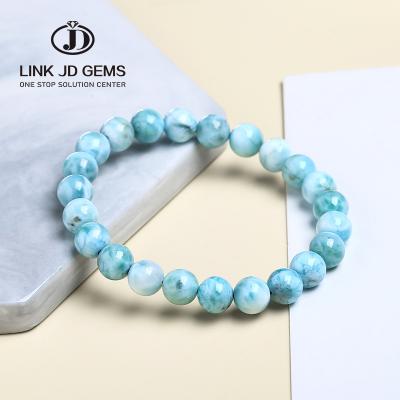 China Natural Mateiral JD Dominica Gemstone Healing Stretch Water 6/8/10 Mm Larimar Natural Blue Beads Bracelet High Quality D.C.A. for sale