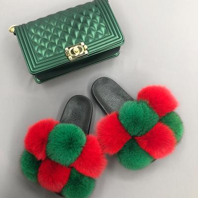 China Real Lightweight Furry Raccoon Fox Fur Pom Pom Slides And Purses Women Fur Slides With Matching Purse for sale