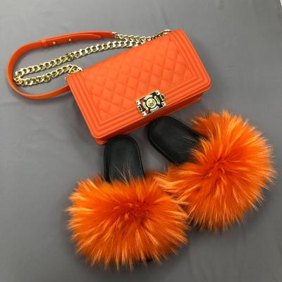 China Colorful Cute Furry Slippers Jelly Purses Lightweight Elegant Ladies Women And Real Big Raccoon Fur Slippers for sale