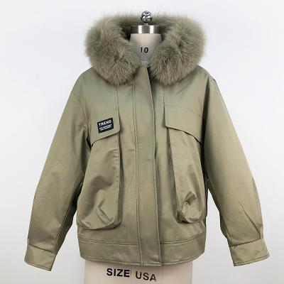 China 2021 Anti-wrinkle women winter parka jackets with big pockets and custom logo reversible parka with fur hood for sale