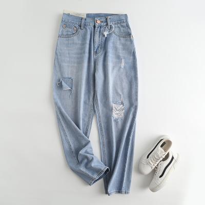 China Stylish Design Light Blue Color Breathable Ripped Jeans Women Vintage Style Casual Loose Wide Leg Denim Pants for sale