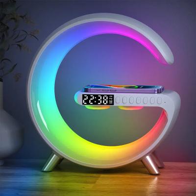 China Newest Mobile Phone Radio Speaker Led Atmosphere Smart Blue Sound Lamp G Shaped Tooth Wireless Charger With Clock Night Light Sunrise for sale