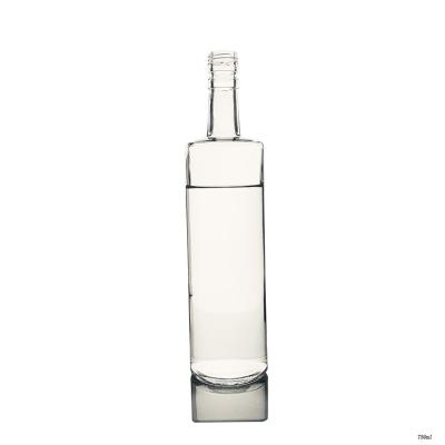 China Beverage Cylinder Shape Clear 750ml Vodka Liquor Glass Bottle With Screw Cap for sale