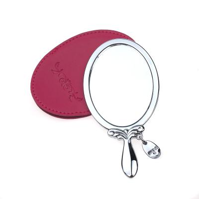 China Personalized Oval Silver Plated Leather PU Handle Makeup Mirror for sale