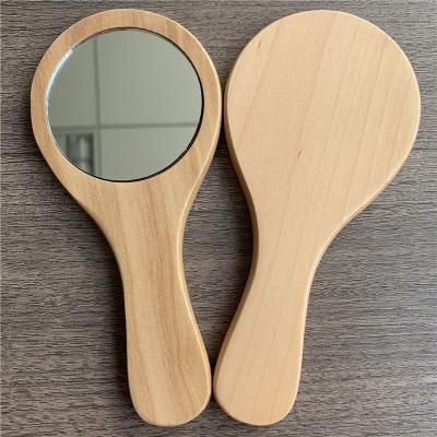 China Enlargement Customize LOGO High Quality Portable Wholesale Natural Wood Handle Round Beauty Salon Makeup Mirror for sale