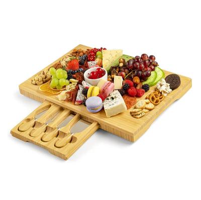 China Viable Sales Amazon Free Sample Cutting Plate Bamboo Cutting Board Bamboo Cheese Board With Knife Set for sale