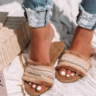 China Damping Tassel Bohemian Ethnic Sandals Flat Slippers for sale