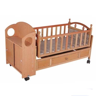 China Wooden Automatic Baby Swing Bed Crib for sale