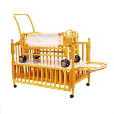 China Adjustable Wooden Baby Cot Bed Cribs with Small Cradle Inside for sale