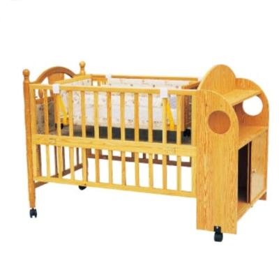 China Personalised Swing Wooden Baby Cot Bed With Cabinet for new born Baby for sale