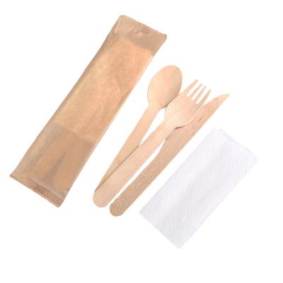 China Food Packaging In Stock Eco - Friendly Wood Fork Spoon Knife Napkin Set Packed With Paper Bag for sale